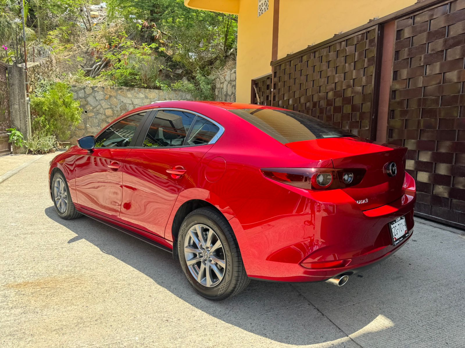 Mazda 3 2024 red side view